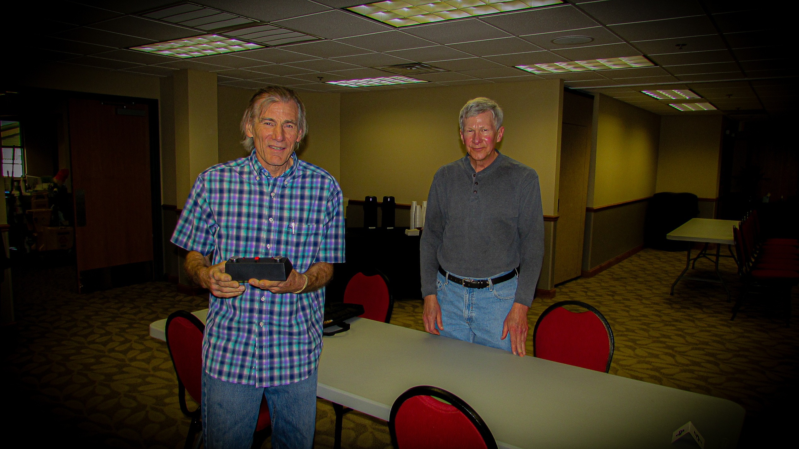 Texans Russ Heise (left) and Jim Kirk (right) arrived early.  Not pictured is Carol Heise who rode with them.  Russ is a Tarrant Chess Team member and Captain of the Texas Military Chess Auxiliary All Stars.  This is his 4th RRSO.  This is Jim Kirk's 2nd RRSO.  Photo by Mike Tubbs.